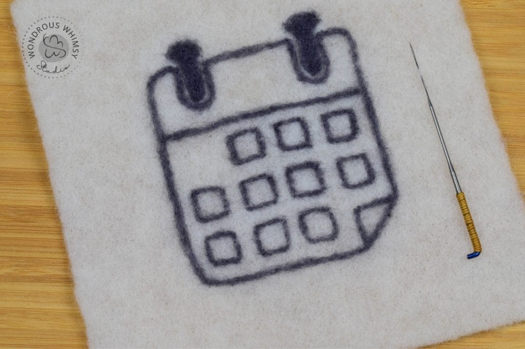 Needle felted calendar on 100% pre-felt